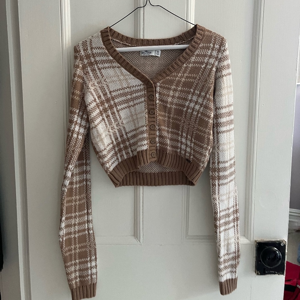 V-neck brown and white button down sweater